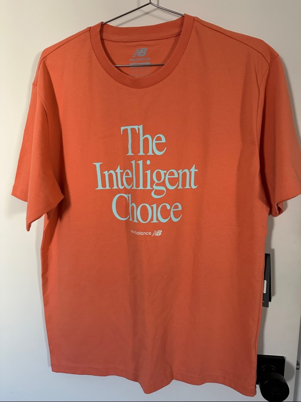 New Balance Men’s Orange 'The Intelligent Choice' Tee with Mint Graphic